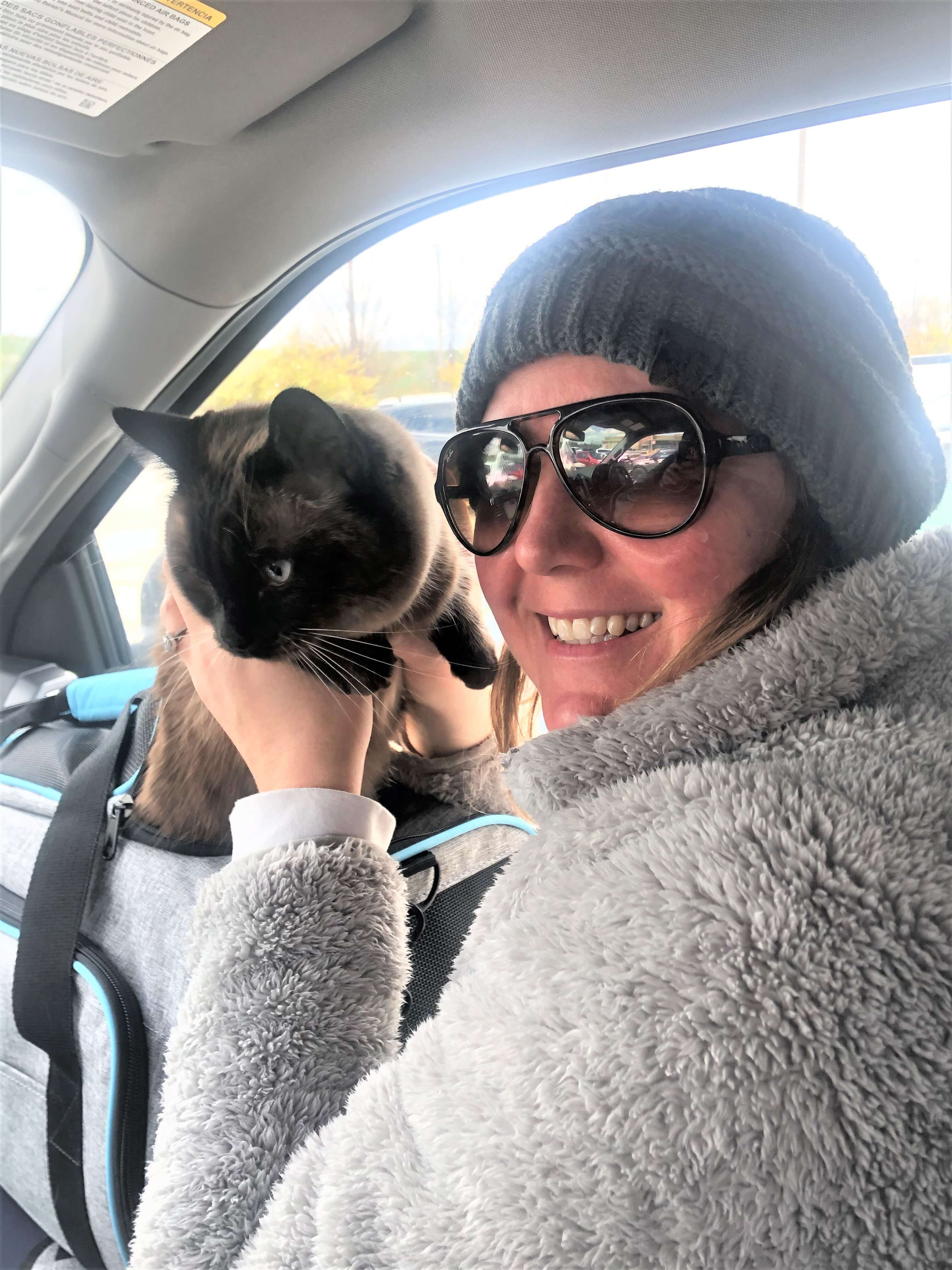 Shelly with Lumpy in the truck on our way to pick up the trailer